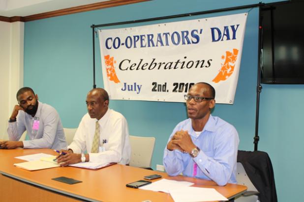 Dr. Philmore Alleyne (right), Lecturer in Accounting at the UWI, Cave Hill Campus, expressed concern about the pace of growth of certain local cooperatives. Sharing the panel with him was Jeremy Stephen (left), Lecturer in Economics at UWI and President of the Barbados Economics Society; whilst Oriel Doyle, President of the Barbados Co-operative Business Association and Chairman of the International Co-operators Day Planning Committee, served as moderator.