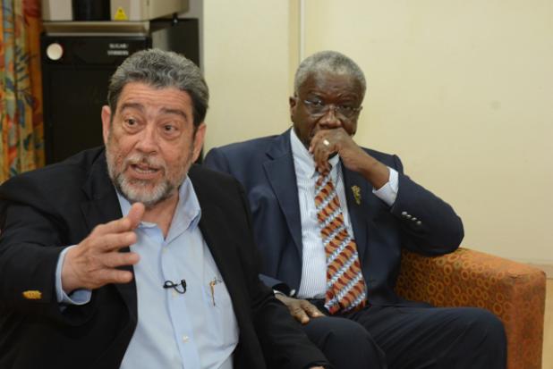 Chairman of LIAT’s Shareholder Board, Prime Minister of St. Vincent and the Grenadines, Dr. Ralph Gonsalves (left) makes a point during a press conference yesterday while Prime Minister, the Right Honourable Freundel Stuart looks on.