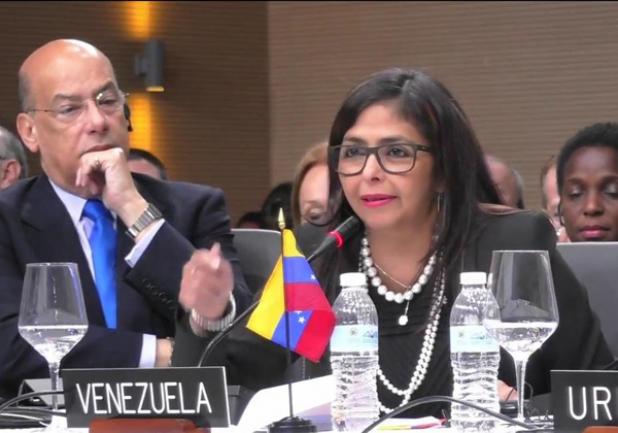Sir Ronald Sanders (left) and Delsey Rodriguez, Venezuela Foreign Minister (right) at the OAS General Assembly. 