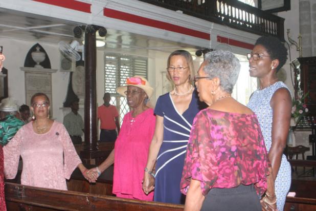 Members of the congregation during the greeting of peace. 