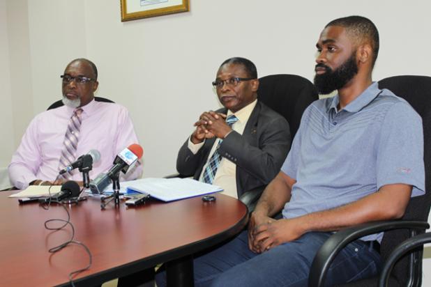 (from left) Chief Town Planner and Co-Chair of the National Habitat III Committee, Mark Cummins; Minister of Housing, Lands and Rural Development, Denis Kellman; and Co-Chair of the National Habitat III Committee, Economist, Jeremy Stephen at yesterday's press conference. 