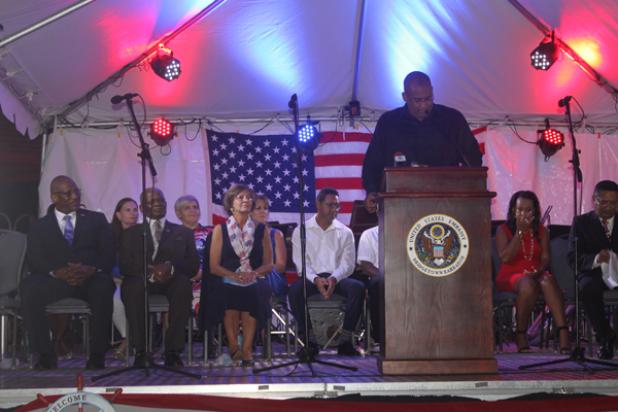 Acting Prime Minister, Richard Sealy, addressing celebrations to mark the 240th Independence of the United States. Looking on are (from left): Governor General of Antigua and Barbuda, His Excellency Sir Rodney Williams; Governor General of Barbados, His Excellency Sir Elliott Belgrave; and US Ambassador to Barbados, the Eastern Caribbean and the OECS, Linda Taglialatela. 