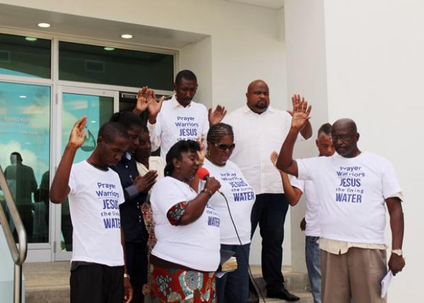 Founder of Prayer Warriors International, Evangelist Courtney Selman (right) and a team from his ministry, gathered on the steps of the BWA’s Headquarters in the Pine, St. Michael to pray for the Management and Staff of the Authority. They later made their way to a number of parishes in Barbados acutely affected by water shortages.