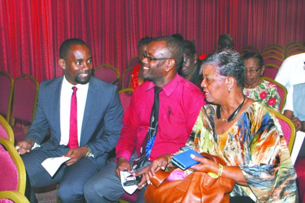 From left to right: Kirk Humphrey, Peter Phillips, BLP Candidate for St. Lucy, and MP for St. Thomas, Cynthia Forde sharing a few words before the start of the lecture.