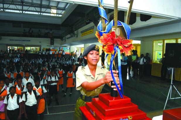 Cadet Melissa Joseph, a student of Frederick Smith Secondary School, had the honour of receiving the Broken Trident on arrival at the school on Friday morning.