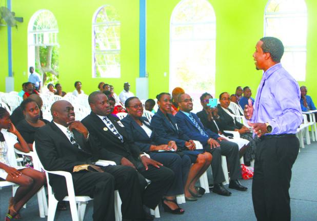 Reverend Ronnie Quimby, Assistant Pastor of the Mount of Praise Wesleyan Holiness Church delivering the sermon. Seated in the front row are the members of the new BNCPTA Executive.