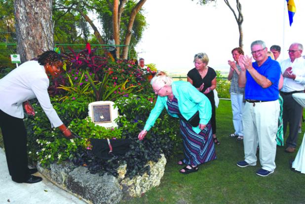 Parliamentary Secretary in the Ministry of Tourism and International Transport, Senator Irene Sandiford-Garner (left) and Christine Blakeley unveiling the plaque stationed in Andrea’s Terrace. 