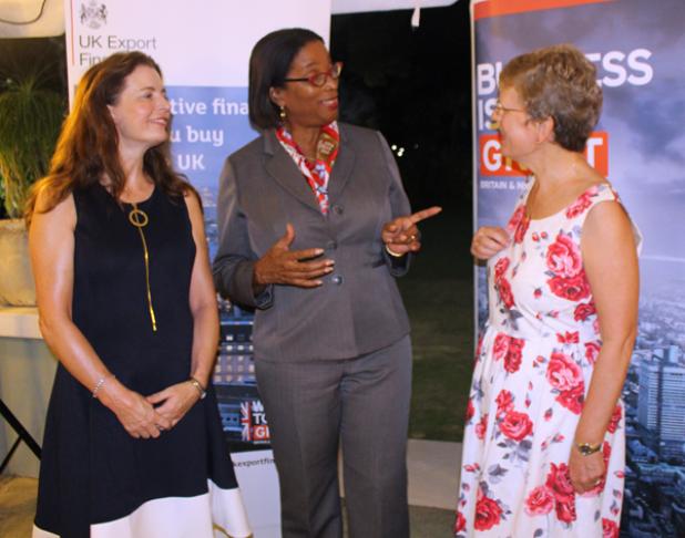 British High Commissioner Her Excellency Janet Douglas has a chat with Minister in the Ministry of Foreign Trade and Regional Director, Caribbean, of the Department of International Trade Laura Ferguson at the networking event held at BenMar on Wednesday night.