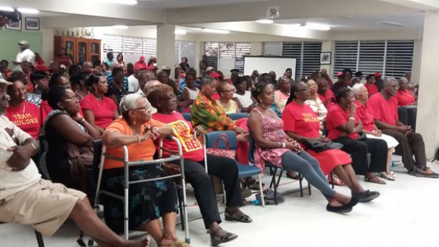 Barbados Labour Party supports gathered for the joint meeting held at George Lamming Primary School. INSET: Barbados Labour Party candidate for St. Michael South Central, Marsha Caddle, addressing the joint meeting.