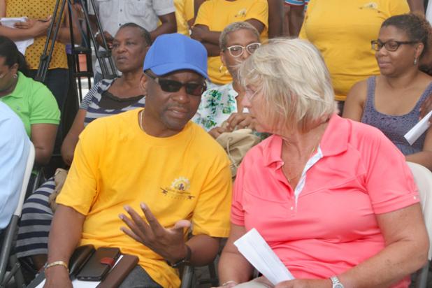 Minister of Culture, Sports and Youth, Stephen Lashley chats with Sharon Christie of the BCCI during the launch yesterday morning.