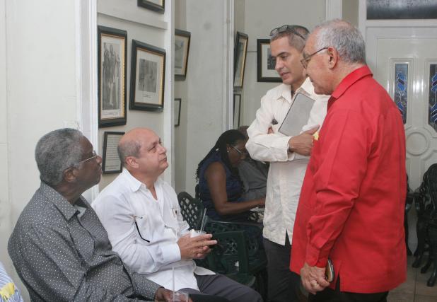 The Right Hon. Freundel Stuart, QC, MP Prime Minister of Barbados conversing with Cuba’s Ambassador to Barbados, Francisco Fernández Peña; Venezuelan Ambassador to Barbados, Jose Gomez Febres; and Francisco Perez of the Venezuelan Embassy.