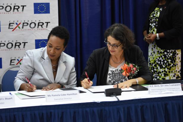 Executive director of Caribbean Export Development Agency, Pamela Coke-Hamilton, with Her Excellency Ambassador Daniela Tramacere, during the official signing of the 11th EDF Regional Private Sector Development Programme yesterday.