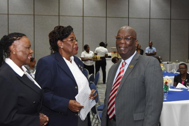 Minister of Education, Ronald Jones, shares a word with BAOP President, Elma Reece (left) and BAOP Activities Chair, Wyndeen Savoury (centre).