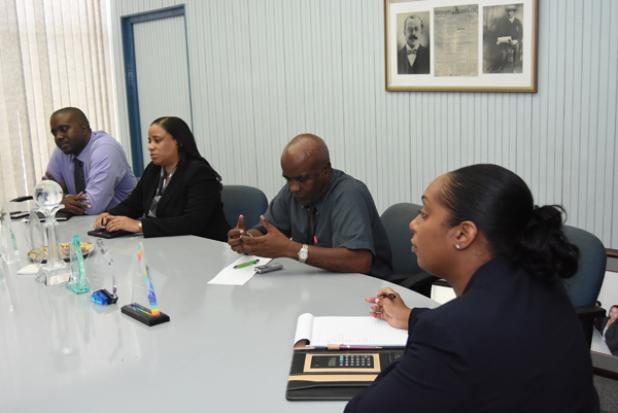 (from left to right) News Editor, Dorian Bryan, Executive Editor, Gillian Marshall, Business Editor, Jewel Brathwaite, and Executive Secretary, Truneal Kwang, during the courtesy call.