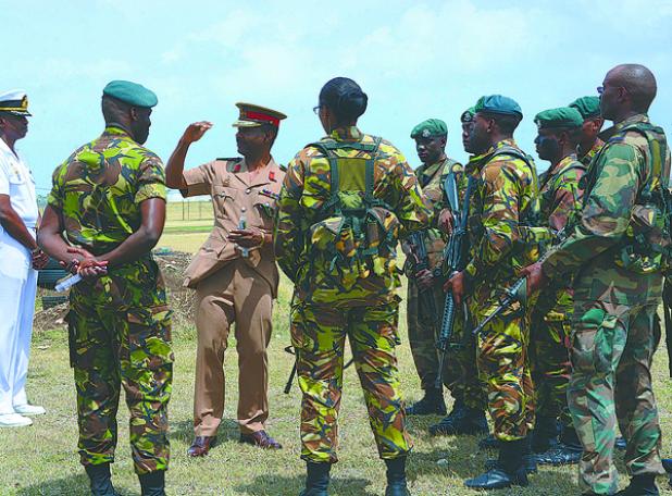   Chief of Staff of the BDF Colonel Alvin Quintyne as he reviewed the Section Battle Drill done by this outfit.
