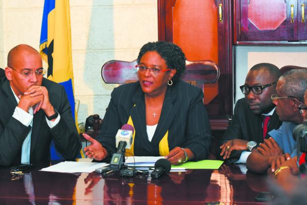 Opposition Leader, Mia Mottley (second left), is joined by Members of Parliament, Kerrie Symmonds (left), Dwight Sutherland (second right) and Gline Clarke, during yesterday’s press conference.