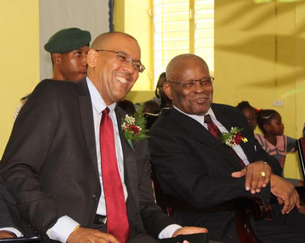 Governor General of Barbados, His Excellency Sir Elliott Belgrave and Member of Parliament for St. James Central, Kerrie Symmonds, share a light moment during the ceremony.