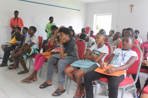 Some of the participants in Project S.O.F.T 2016, listening attentively during the talk on ‘Adolescent Development & Sexuality’ by Youth Development Officer/ Social Worker with the Barbados Family Planning Association, Keriann Hurley (INSET).