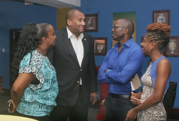 (L-R) Personal Assistant to Alison Hinds, Jennifer Yung, Minister of Tourism, Hon. Richard Sealy, Committee Member of Barbados is Music, Shawn Franklin and Public Relations Manager of Krosfyah, Ingrid Holder socialising at the launch of the Barbados is Music show.