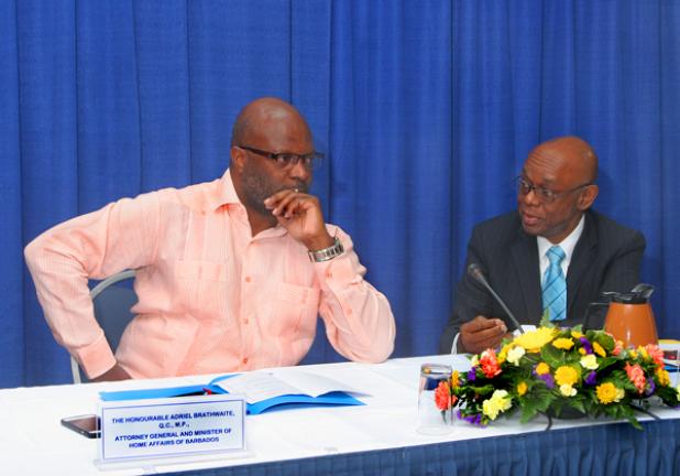 The Minister of Home Affairs and Attorney General, Hon. Adriel Brathwaite, sitting at the Head Table next to the Immediate Past Chairman of the General Legal Council of Jamaica, Hon. Michael Hylton.