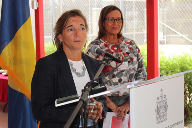 High Commissioner of Canada to Barbados and the Eastern Caribbean, Her Excellency Marie Legault, (left), makes a brief address as CWC Community Services Chair, Ann Smith, gives a listening ear.