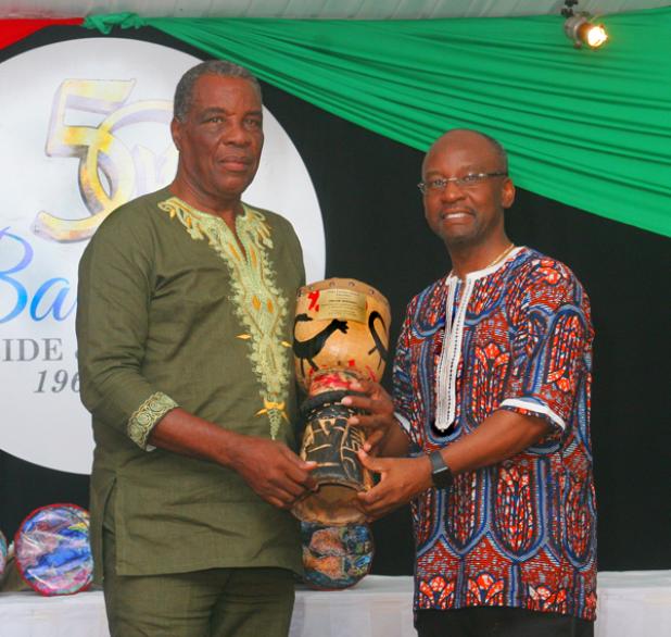 Minister of Culture, Sports and Youth, Stephen Lashley, presenting the Culture Award to Trevor Marshall.
