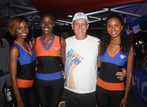 Roger Skeete and the SOL Rally Nation Promotion girls.