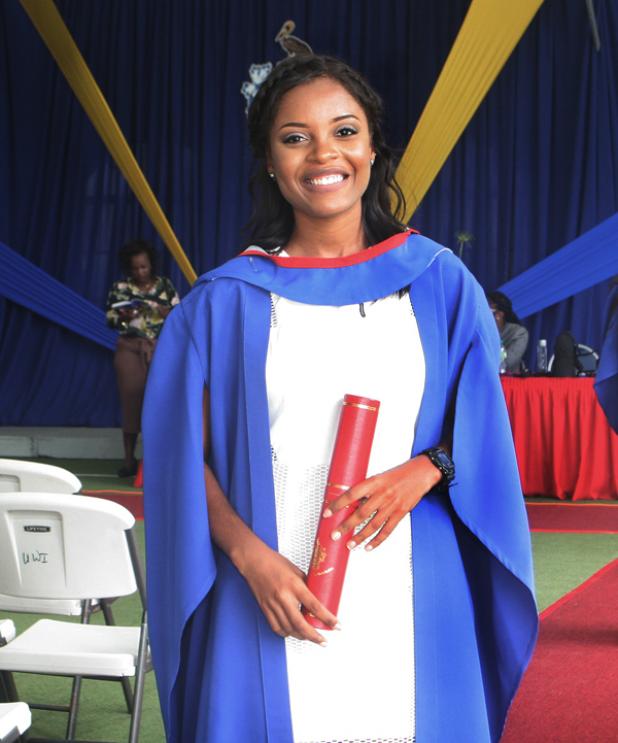 Advocate Journalist, Cara Leigh-Ann Foster, graduating with a Bachelor of Arts degree.