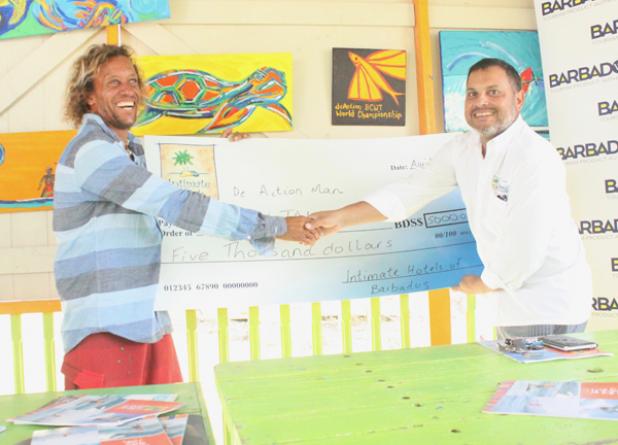 Intimate Hotels, which has several member properties in the Silver Sands area, is a sponsor of this year's event. Here, Board Chair Omar Allahar (right) hands over a cheque to Brian Talma, ahead of next month’s event.