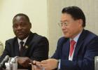 Minister of Industry, International Business, Commerce and Small Business Development, Donville Inniss (left); and United Nations Industrial Development Organisation’s Director General, Li Yong, as they addressed the media.