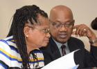 (left) General Secretary of the National Union of Public Workers, Roslyn Smith, in conversation with President of the Congress of Trade Unions and Staff Associations of Barbados, Cedric Murrell, yesterday.