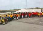 Hundreds gathered with their red and yellow shirts at Bushy Park Racing Circuit.