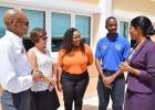 Two of the Ocean Two Resort staffers in the NVQ programme in Customer Service, Sadie White (third from right) and Dwayne Greenidge (second right), in conversation with Labour Minister, Senator Esther Byer-Suckoo, General Manager, Paul Collymore (left) and Group General, Manager Patricia Dass.